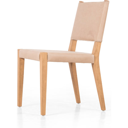 Villa Dining Chair by Four Hands. Made from hair on hide, solid beech, iron in a rustic style.