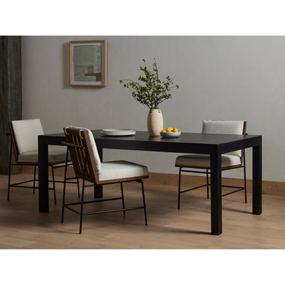 Isador Dining Table by Four Hands. Made from solid poplar in a modern style.