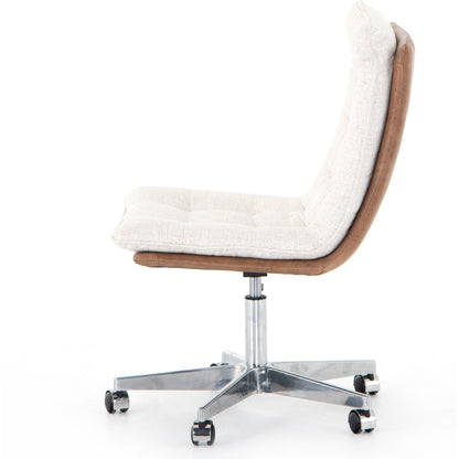 Quinn Desk Chair by Four Hands in polished nickel, dover crescent, chaps saddle and chaps saddle. Made from aluminum, 71% viscose (rayon), 17% polyester, 12% flax, linen, top grain leather in a modern style.