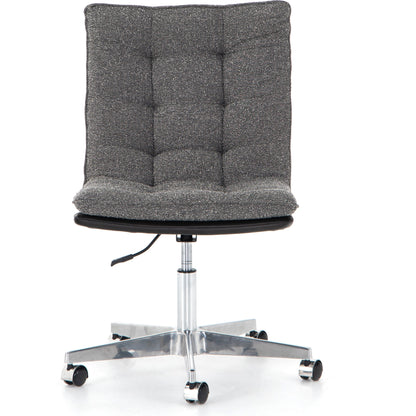Quinn Desk Chair by Four Hands in polished nickel, dover crescent, chaps saddle and chaps saddle. Made from aluminum, 71% viscose (rayon), 17% polyester, 12% flax, linen, top grain leather in a modern style.