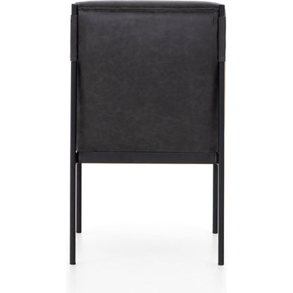Klein Dining Chair by Four Hands in sonoma black. Made from top grain leather, iron, 100% polyester in a modern style.