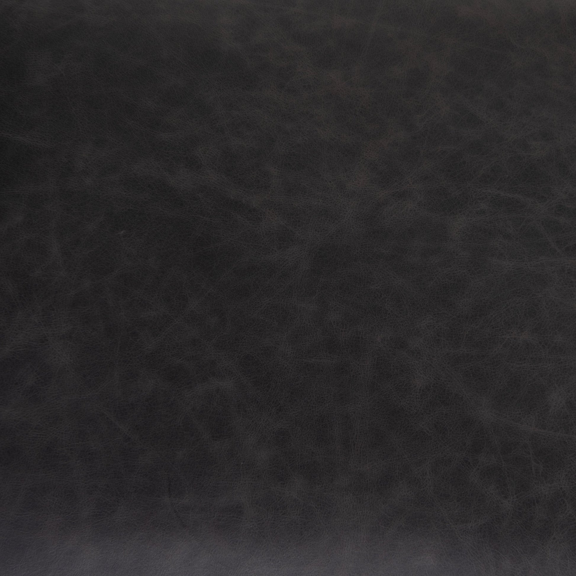Klein Dining Chair by Four Hands in sonoma black. Made from top grain leather, iron, 100% polyester in a modern style.
