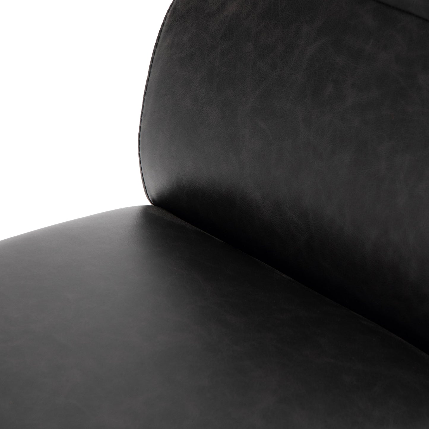 008 SI-1715824 | Closeup | Klein Dining Chair by Four Hands in sonoma black. Made from top grain leather, iron, 100% polyester in a modern style.