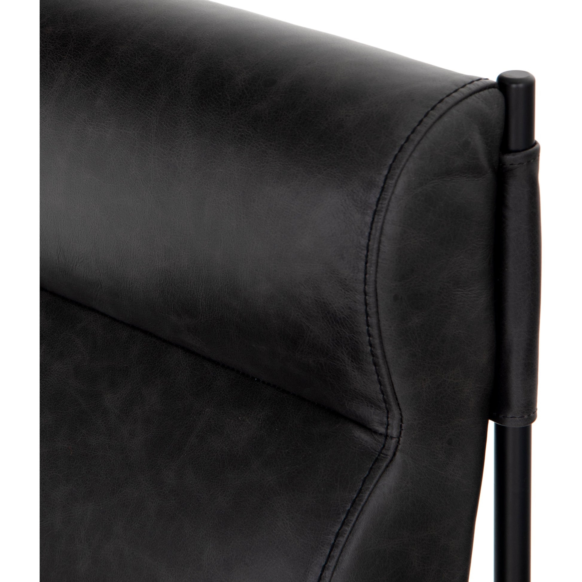 Klein Dining Chair by Four Hands in sonoma black. Made from top grain leather, iron, 100% polyester in a modern style.