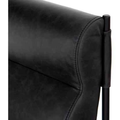 Klein Dining Chair by Four Hands in sonoma black. Made from top grain leather, iron, 100% polyester in a modern style.