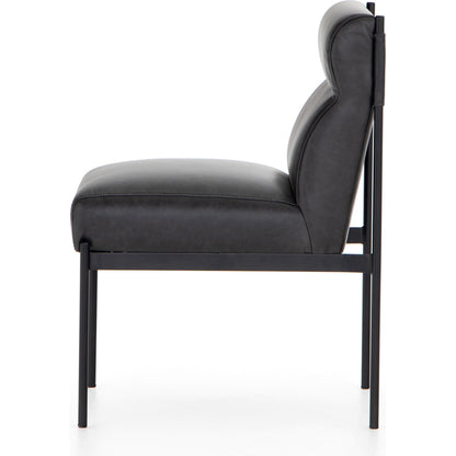 Klein Dining Chair by Four Hands in sonoma black. Made from top grain leather, iron, 100% polyester in a modern style.