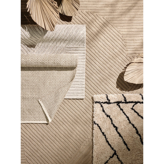 Chasen Outdoor Rug by Four Hands in heathered natural and heathered natural. Made from 100% polyethylene terephthalate (pet) in a unique style.