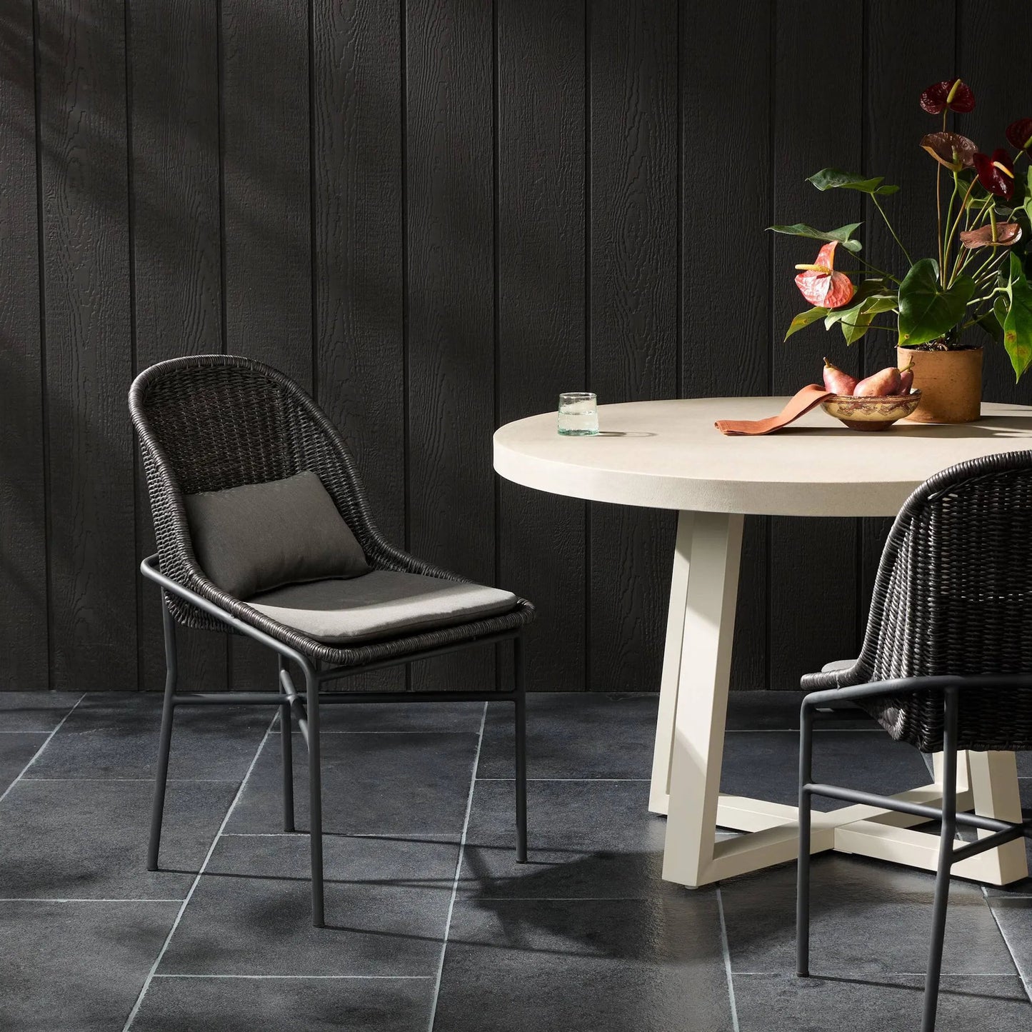 022 SI-2137408 | Lifestyle | Jericho Outdoor Dining Chair by Four Hands. Made from unique in a modern style.