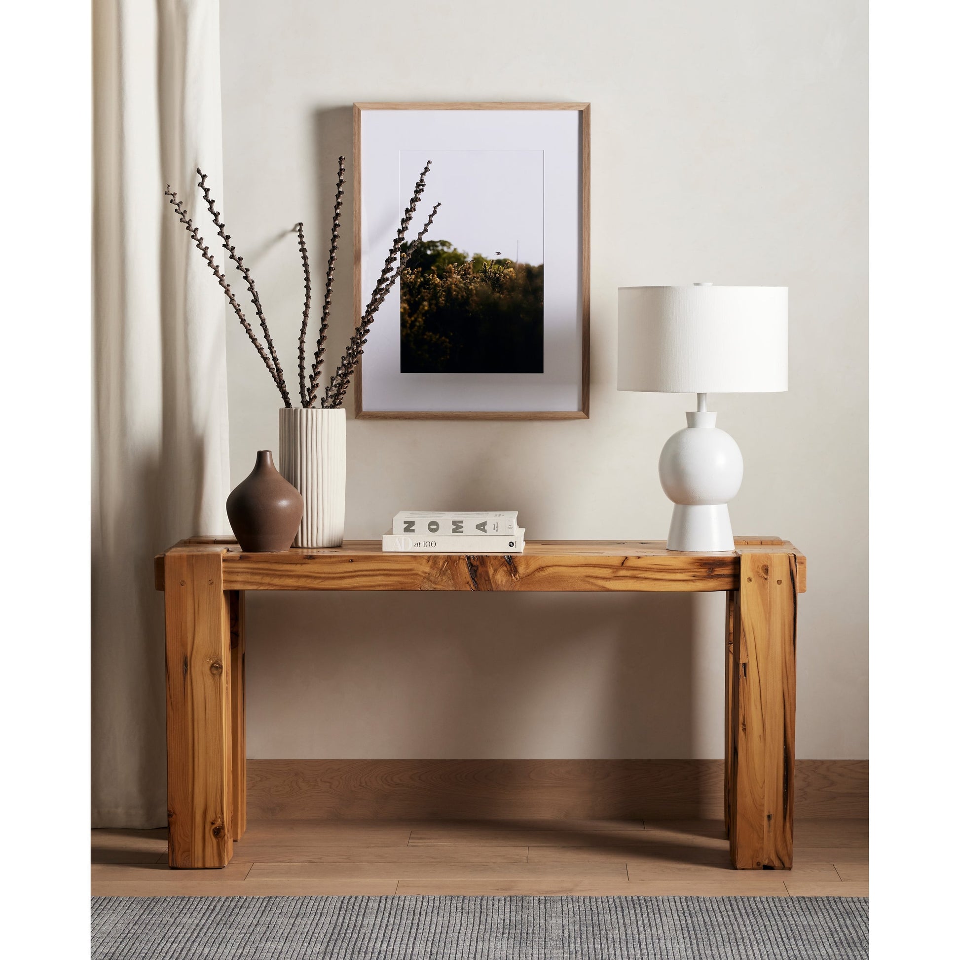 Kelita Table Lamp by Four Hands in textured black. Made from aluminum, 60% polyester, 40% viscose (rayon), thermoplastic in a transitional style.