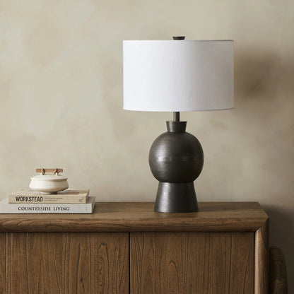 Kelita Table Lamp by Four Hands in textured black. Made from aluminum, 60% polyester, 40% viscose (rayon), thermoplastic in a transitional style.