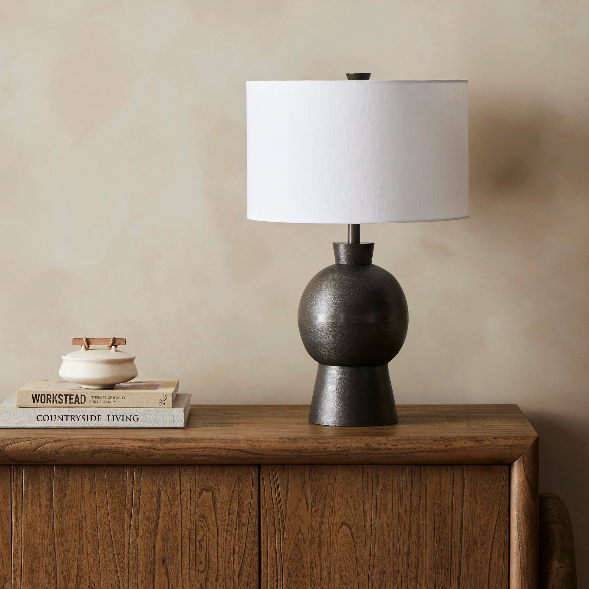 Kelita Table Lamp by Four Hands in textured black. Made from aluminum, 60% polyester, 40% viscose (rayon), thermoplastic in a transitional style.