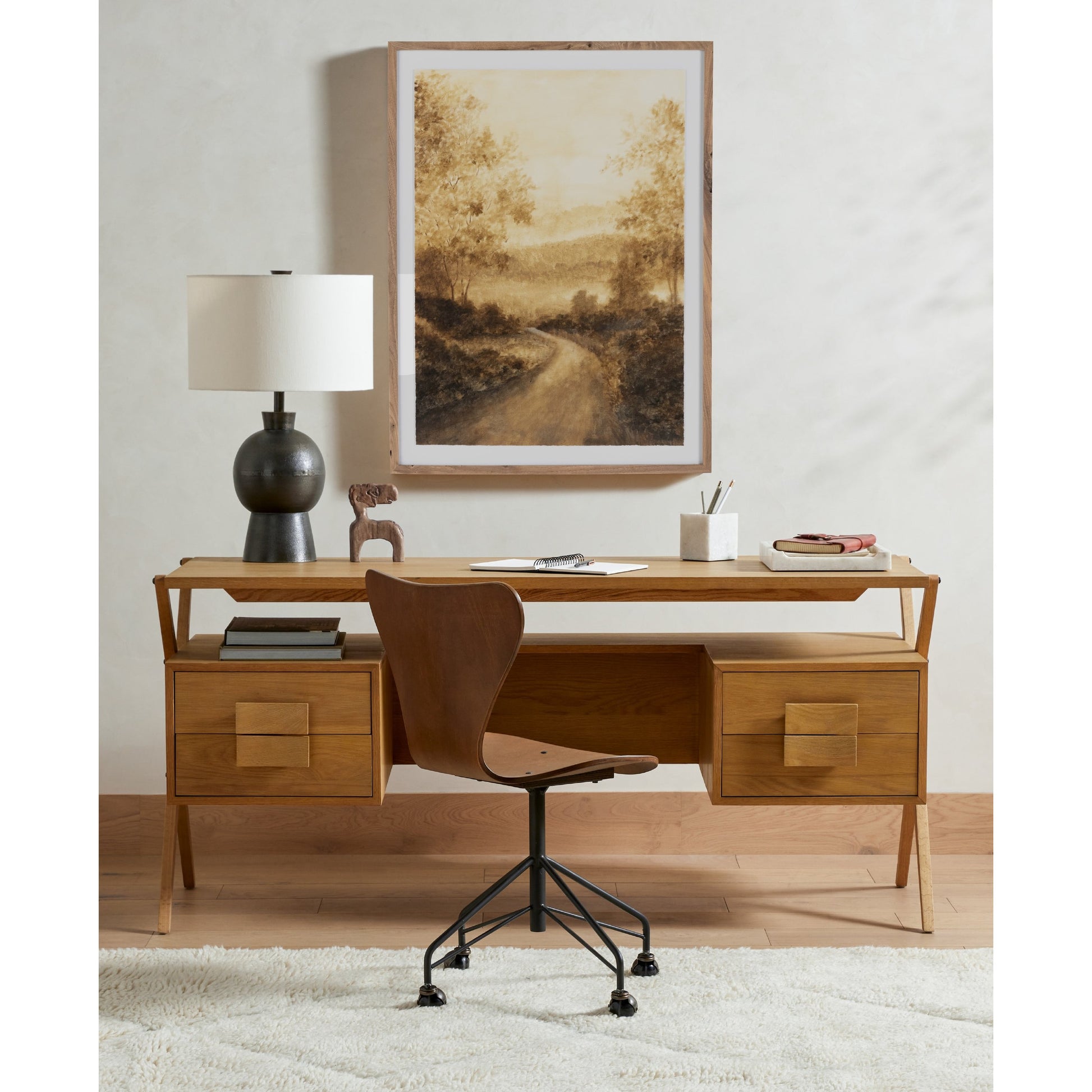 Kelita Table Lamp by Four Hands in textured black. Made from aluminum, 60% polyester, 40% viscose (rayon), thermoplastic in a transitional style.