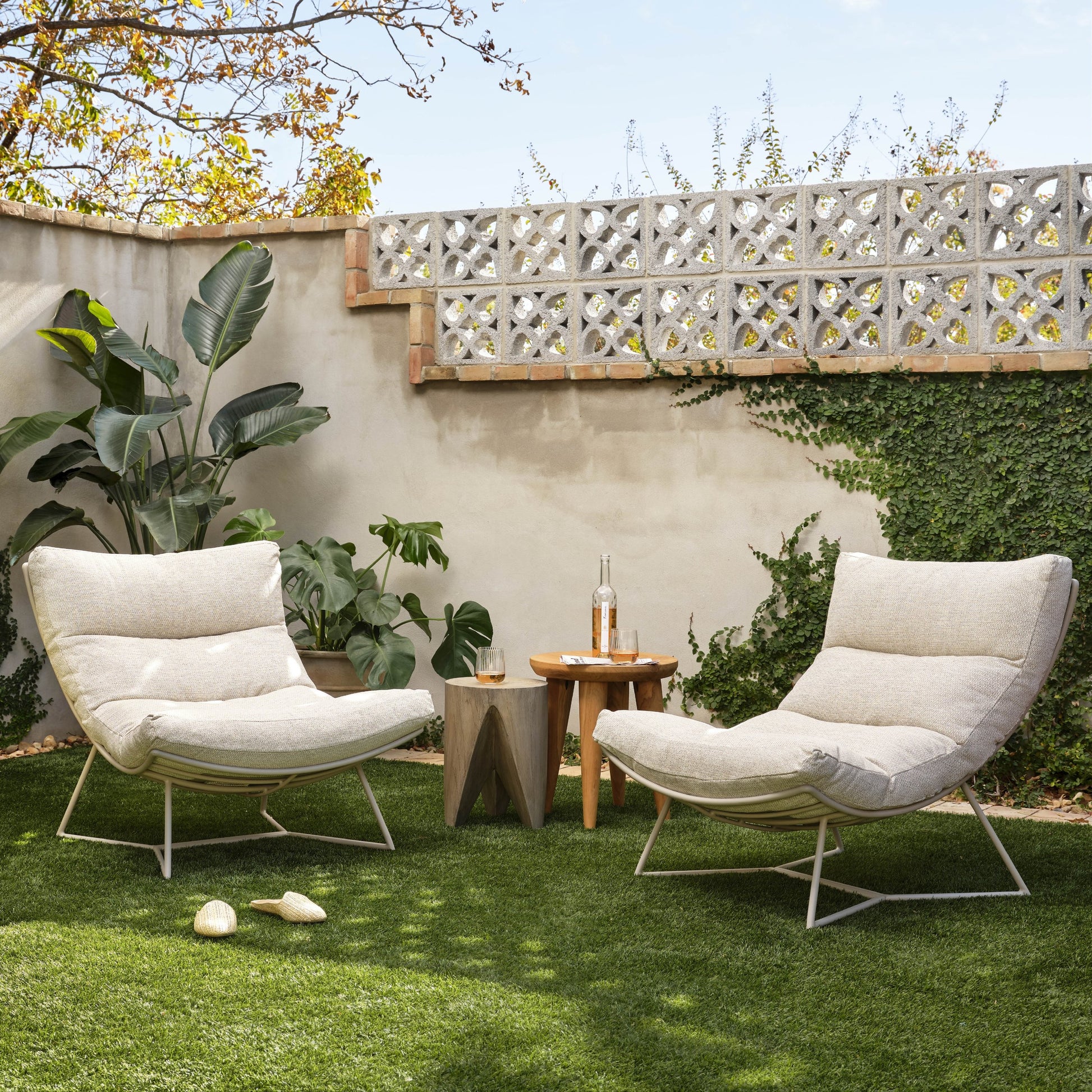 Petros Outdoor End Table by Four Hands. Made from solid teak in a eclectic & global style.