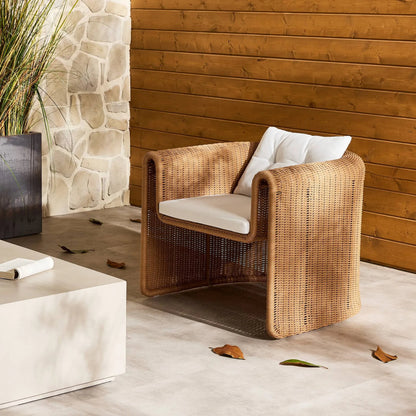 Tucson Woven Outdoor Chair by Four Hands. Made from 100% olefin, 100% polyethylene, iron in a coastal style.