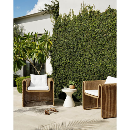 Tucson Woven Outdoor Chair by Four Hands. Made from 100% olefin, 100% polyethylene, iron in a coastal style.