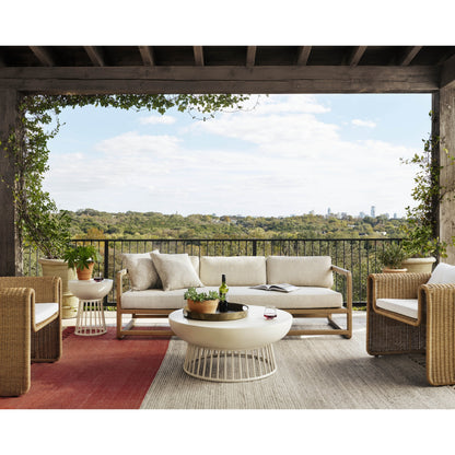 Tucson Woven Outdoor Chair by Four Hands. Made from 100% olefin, 100% polyethylene, iron in a coastal style.