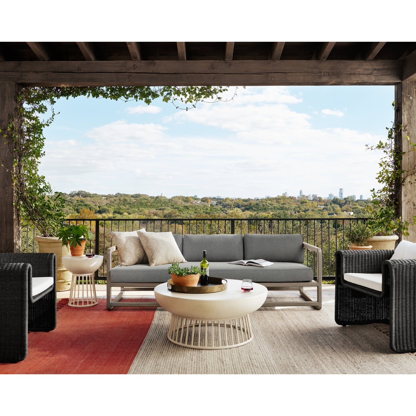 024 SI-1717070 | Lifestyle | Tucson Woven Outdoor Chair by Four Hands. Made from 100% olefin, 100% polyethylene, iron in a coastal style.