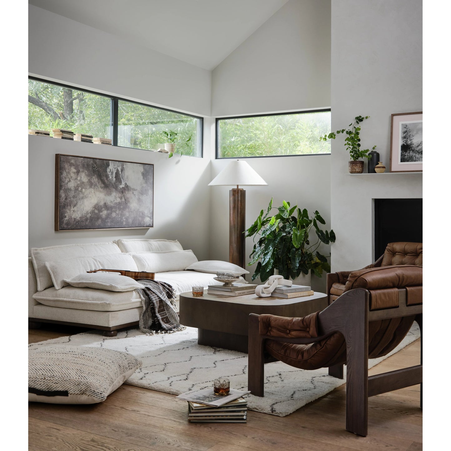 021 SI-1977097 | Lifestyle | Blanco Coffee Table by Four Hands in warm umber burl. Made from walnut burl veneer, thick mahogany veneer, pine plywood in a modern style.