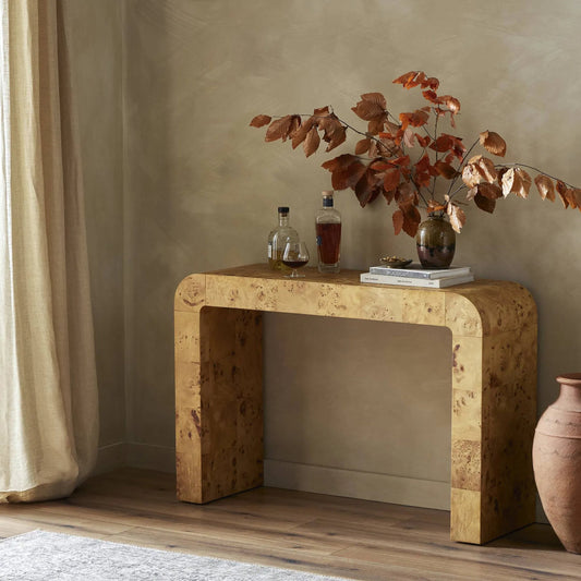Jenson Console Table by Four Hands in natural poplar burl veneer and natural poplar burl. Made from poplar burl veneer in a coastal style.