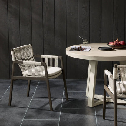 Shuman Outdoor Dining Chair by Four Hands in stone grey, bronze, heathered grey rope and stone gray. Made from 100% olefin, aluminum, 100% polypropylene in a modern style.