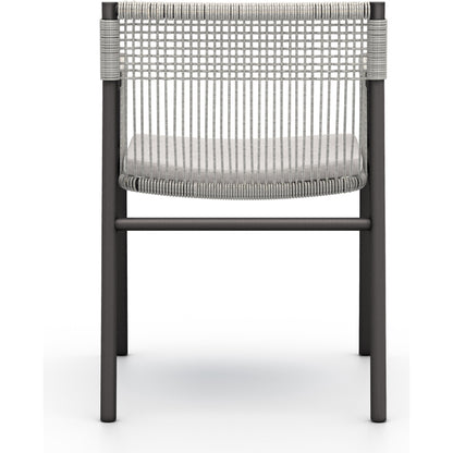 Shuman Outdoor Dining Chair by Four Hands. Made from 100% olefin, aluminum, 100% polypropylene in a modern style.