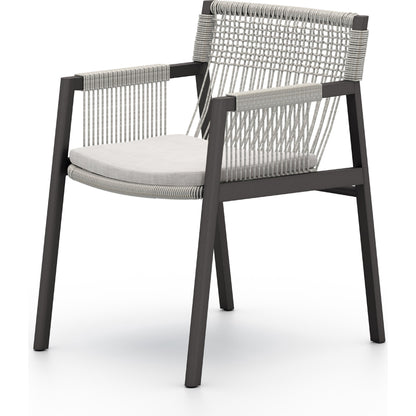 Shuman Outdoor Dining Chair by Four Hands. Made from 100% olefin, aluminum, 100% polypropylene in a modern style.