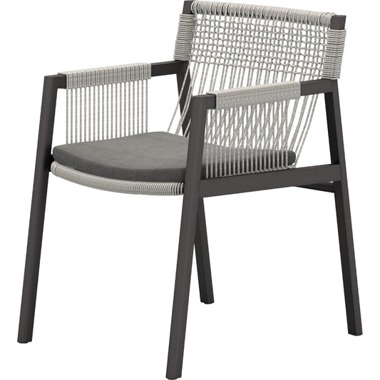 Shuman Outdoor Dining Chair by Four Hands. Made from 100% olefin, aluminum, 100% polypropylene in a modern style.