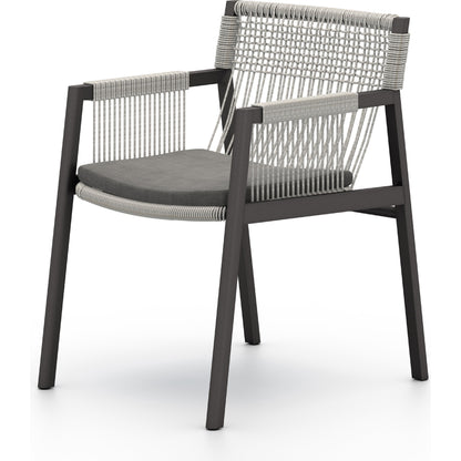 Shuman Outdoor Dining Chair by Four Hands. Made from 100% olefin, aluminum, 100% polypropylene in a modern style.