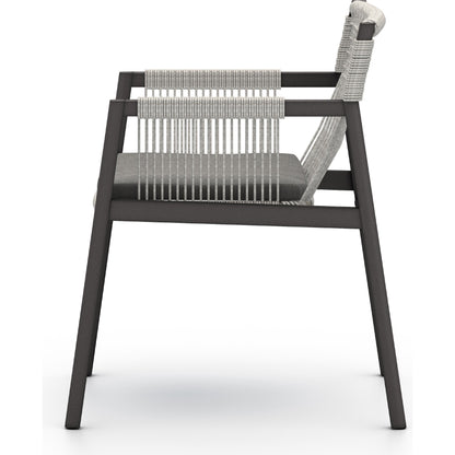Shuman Outdoor Dining Chair by Four Hands. Made from 100% olefin, aluminum, 100% polypropylene in a modern style.