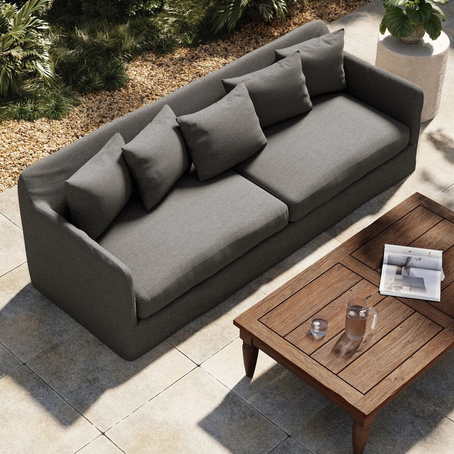 092 SI-1714951 | Lifestyle | Dade Outdoor Sofa by Four Hands. Made from 100% olefin, aluminum, 91% polyurethane foam pad, 9% polyester fiber batting in a modern style.