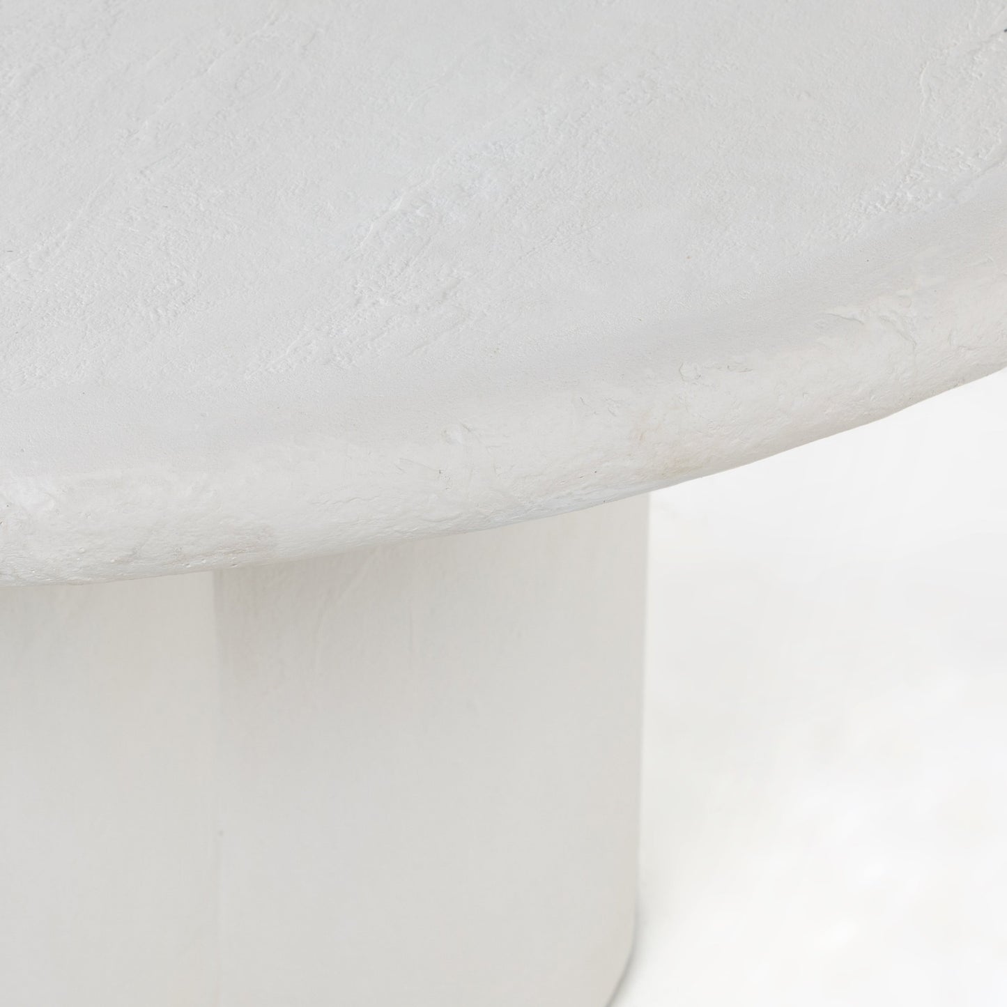 007 SI-1715450 | Closeup | Grano Dining Table by Four Hands in white plaster molded concrete. Made from concrete in a modern style.