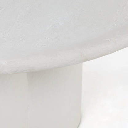 Grano Dining Table by Four Hands in white plaster molded concrete. Made from concrete in a modern style.