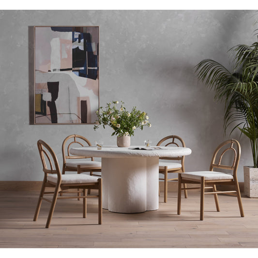 Grano Dining Table by Four Hands in white plaster molded concrete. Made from concrete in a modern style.