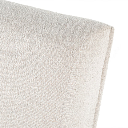 Bronwyn Swivel Chair by Four Hands in knoll natural, distressed natural. Made from 95% polyester, 5% acrylic, solid parawood, 100% polyester in a eclectic & global style.