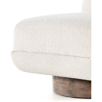 Bronwyn Swivel Chair by Four Hands in knoll natural, distressed natural. Made from 95% polyester, 5% acrylic, solid parawood, 100% polyester in a eclectic & global style.