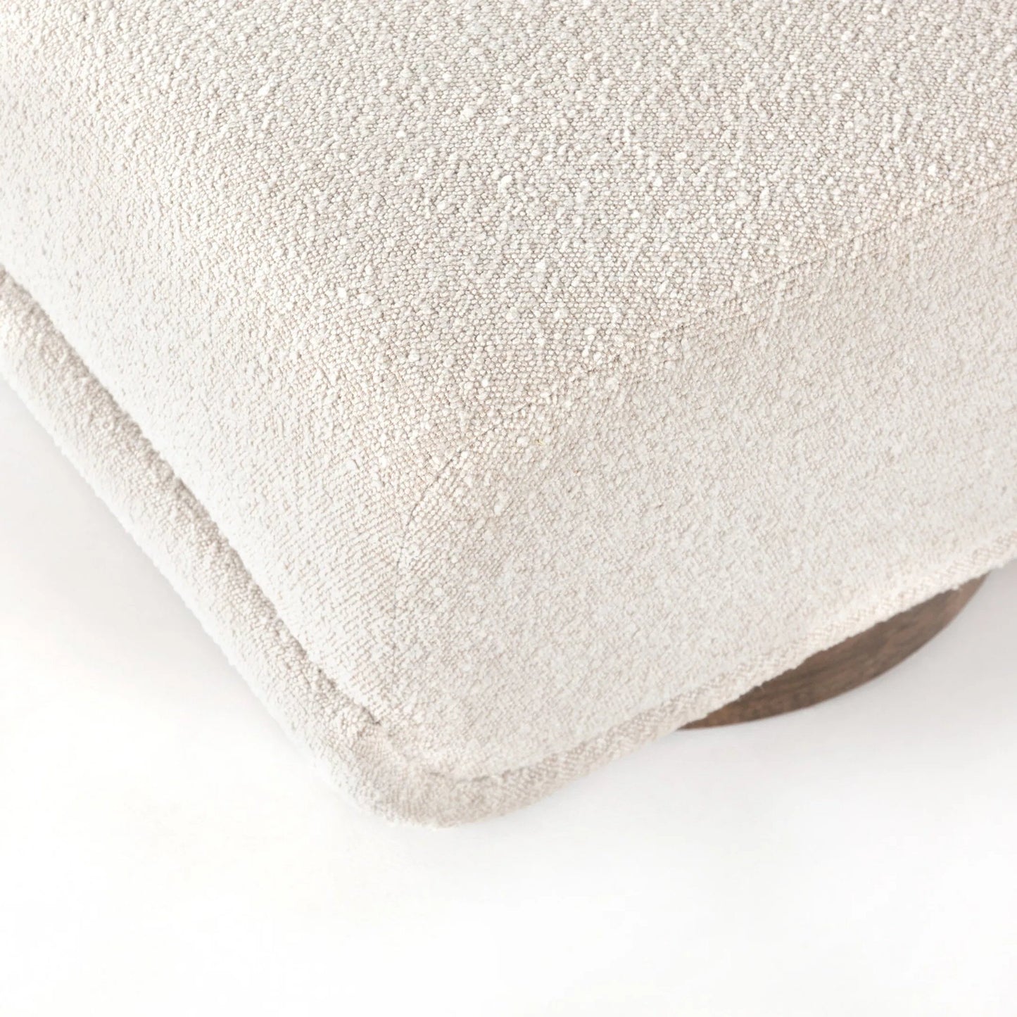 119 SI-1714606 | Closeup | Bronwyn Swivel Chair by Four Hands in knoll natural, distressed natural. Made from 95% polyester, 5% acrylic, solid parawood, 100% polyester in a eclectic & global style.