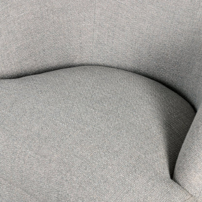 Sandie Swivel Chair by Four Hands in gibson silver and tawny oak. Made from 97% polyester, 3% acrylic, solid oak, poplar plywood in a modern style.