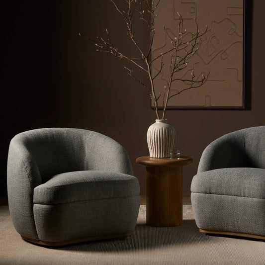 Sandie Swivel Chair by Four Hands in gibson silver and tawny oak. Made from 97% polyester, 3% acrylic, solid oak, poplar plywood in a modern style.