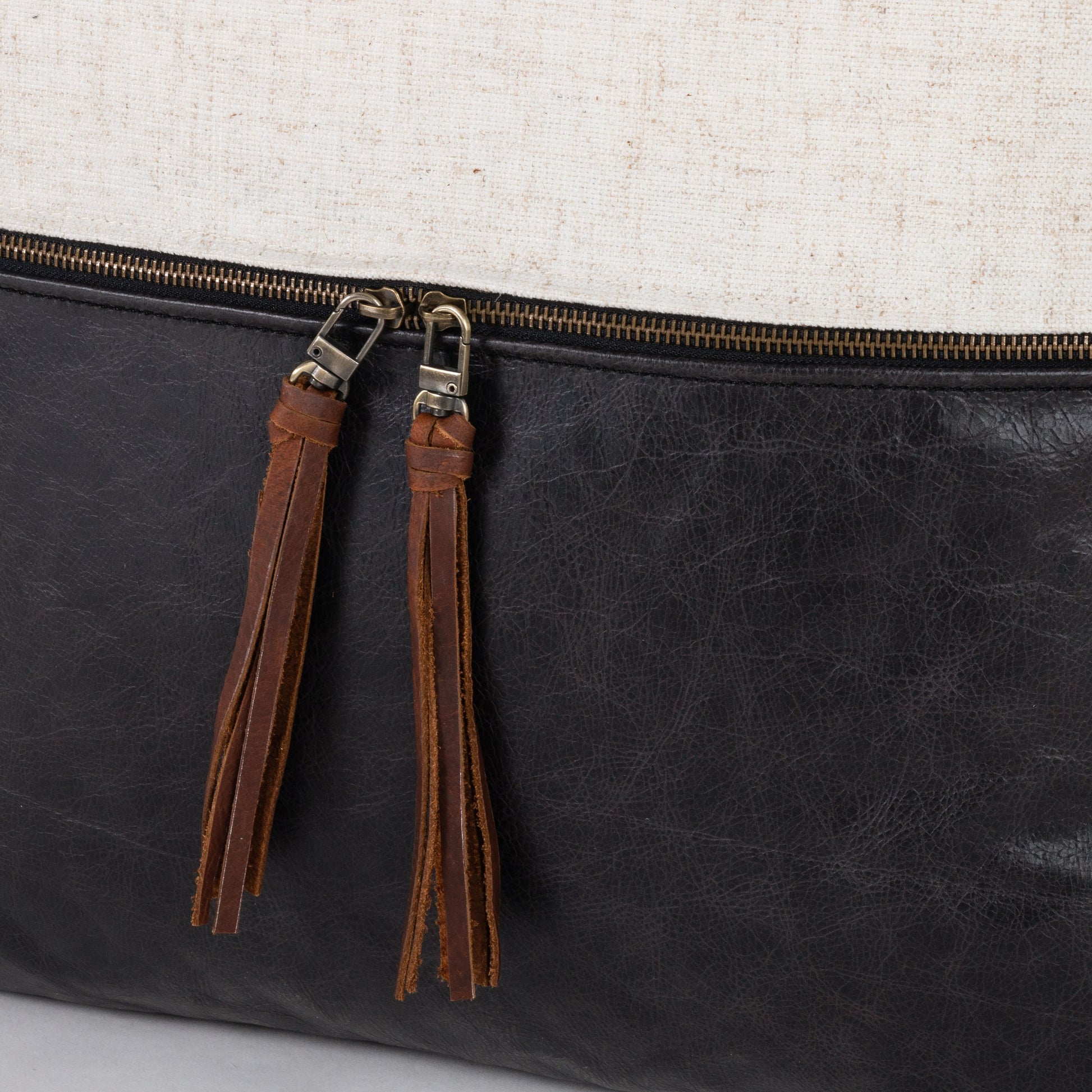 Leather and Linen Pillow by Four Hands in thames cream, sonoma butterscotch and butterscotch. Made from top grain leather, 66% polyester, 19% acrylic, 15% flax, linen in a eclectic & global style.