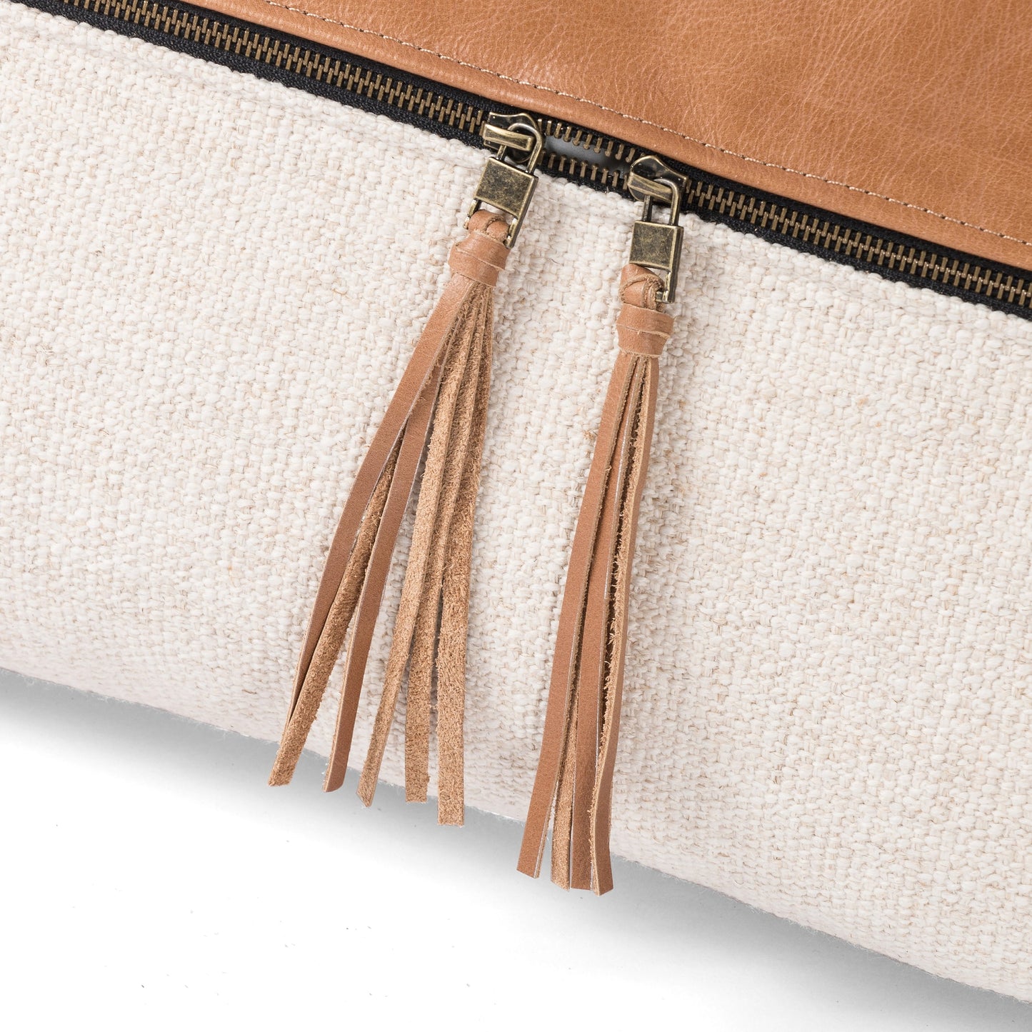 004 SI-1797919 | Closeup | Leather and Linen Pillow by Four Hands in thames cream, sonoma butterscotch and butterscotch. Made from top grain leather, 66% polyester, 19% acrylic, 15% flax, linen in a eclectic & global style.