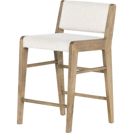 Charon Counter Stool by Four Hands in knoll natural and weathered drift. Made from 95% polyester, 5% acrylic, solid parawood, 100% polyester in a transitional style.