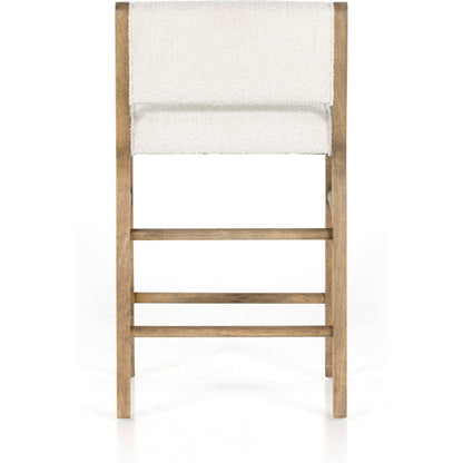Charon Counter Stool by Four Hands in knoll natural and weathered drift. Made from 95% polyester, 5% acrylic, solid parawood, 100% polyester in a transitional style.