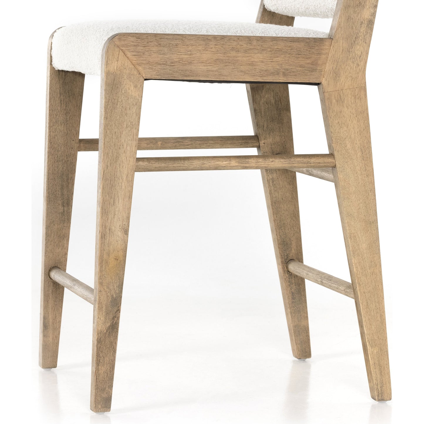 003 SI-1798871 | Closeup | Charon Counter Stool by Four Hands in knoll natural and weathered drift. Made from 95% polyester, 5% acrylic, solid parawood, 100% polyester in a transitional style.