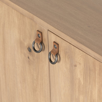 Isador Bar Cabinet by Four Hands in black wash poplar, natural iron, black leather and black wash poplar. Made from solid poplar, top grain leather in a modern style.