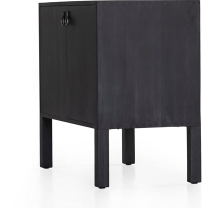 Isador Bar Cabinet by Four Hands in black wash poplar, natural iron, black leather and black wash poplar. Made from solid poplar, top grain leather in a modern style.