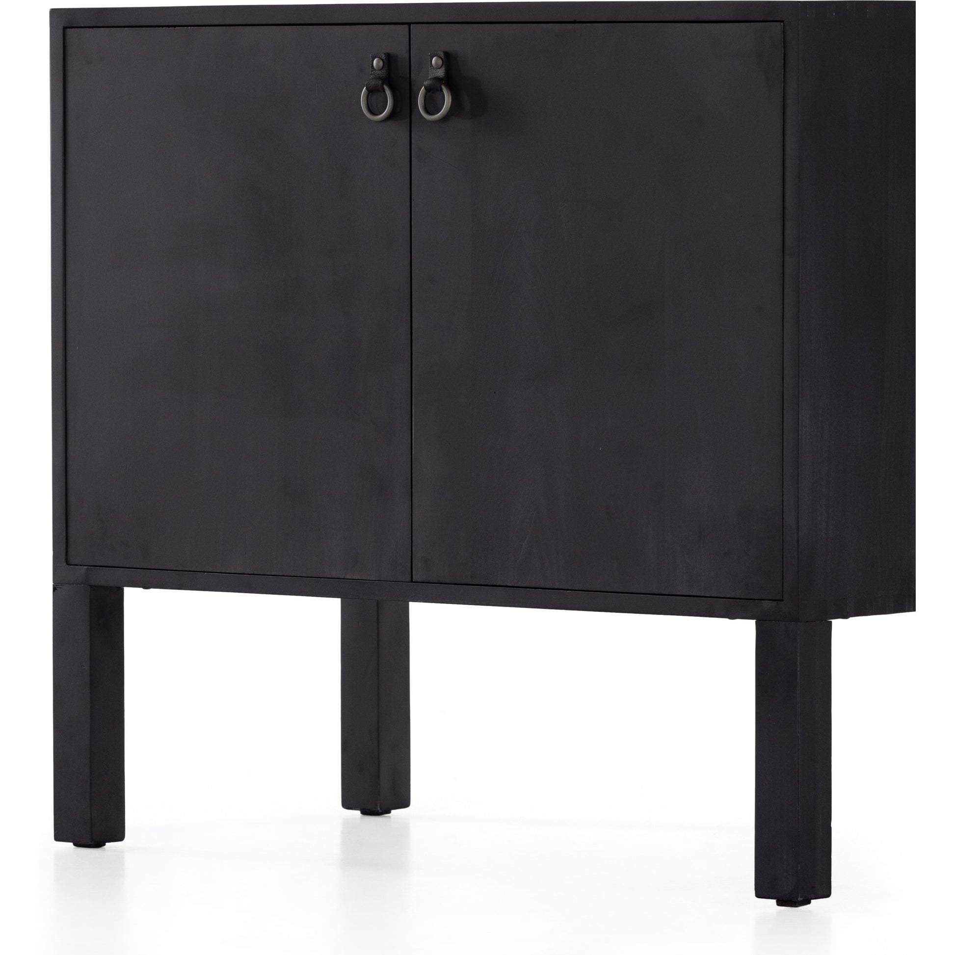 Isador Bar Cabinet by Four Hands in black wash poplar, natural iron, black leather and black wash poplar. Made from solid poplar, top grain leather in a modern style.