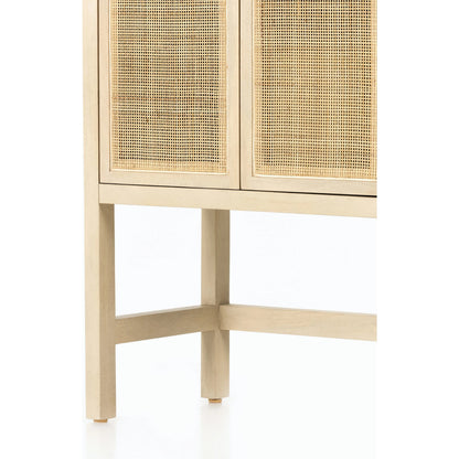 Caprice Narrow Cabinet by Four Hands. Made from cane, solid mango in a cottage & farmhouse style.