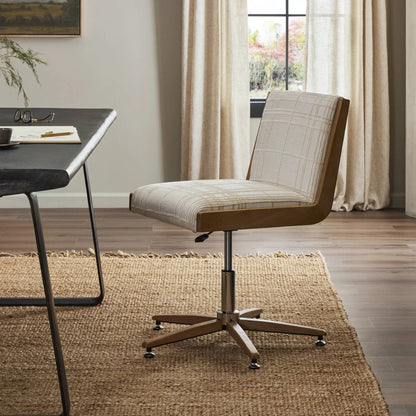 Carla Desk Chair by Four Hands. Made from 100% polyester, solid oak in a modern style.