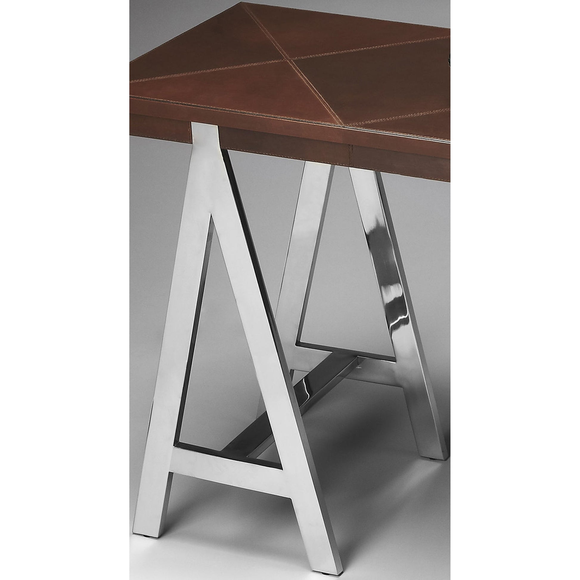 Maxim Console Table by Butler Specialty Company in multi-color and nickel. Made from leather, mdf, stainless steel in a modern style.