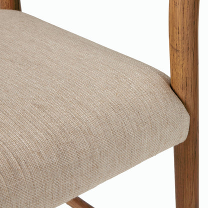 Glenmore Counter Stool by Four Hands in essence natural. Made from 49% viscose (rayon), 22% flax, linen, 18% polyester, 11% cotton, solid oak, 100% polyurethane foam pad in a modern style.